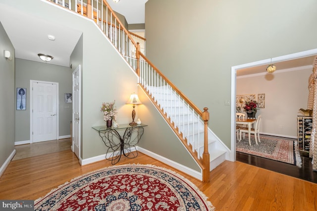 1280 Saint Michaels Rd, Mount Airy, MD 21771 - stairway featuring wood finished floors, a high ceiling, and baseboards
