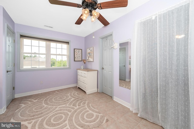 1280 Saint Michaels Rd, Mount Airy, MD 21771 - unfurnished bedroom featuring light tile patterned floors, baseboards, and ceiling fan