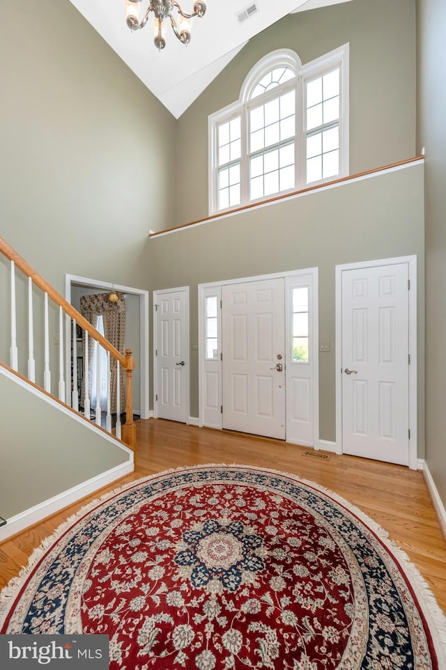1280 Saint Michaels Rd, Mount Airy, MD 21771 - foyer with a chandelier, high vaulted ceiling, wood finished floors, and plenty of natural light