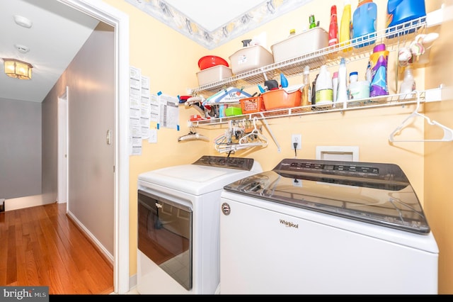 1280 Saint Michaels Rd, Mount Airy, MD 21771 - washroom featuring washing machine and dryer, wood finished floors, and baseboards