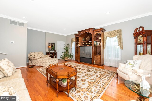 1280 Saint Michaels Rd, Mount Airy, MD 21771 - living area with wood finished floors, ornamental molding, recessed lighting, and baseboards