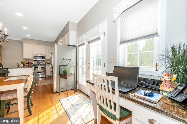1280 Saint Michaels Rd, Mount Airy, MD 21771 - kitchen with stainless steel appliances, dark countertops, white cabinets, light wood-style floors, and recessed lighting