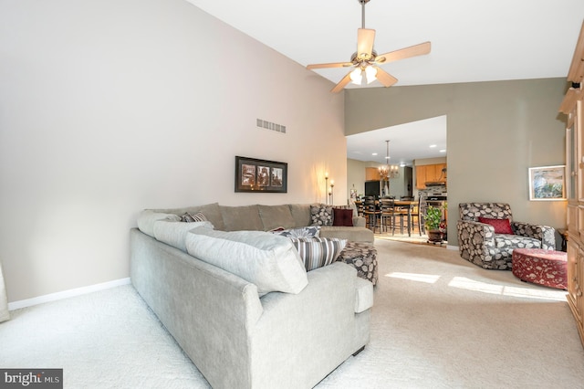 1280 Saint Michaels Rd, Mount Airy, MD 21771 - living area with light carpet, a chandelier, a ceiling fan, baseboards, and high vaulted ceiling
