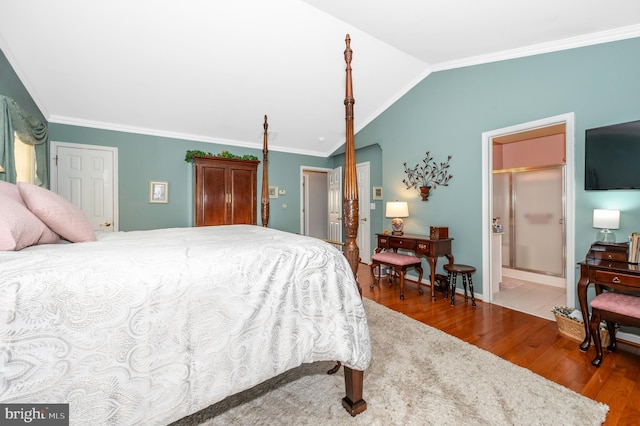 1280 Saint Michaels Rd, Mount Airy, MD 21771 - bedroom featuring wood finished floors, vaulted ceiling, crown molding, connected bathroom, and baseboards