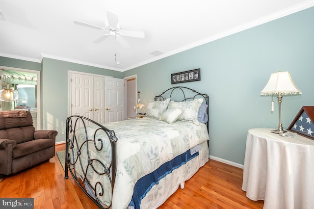 1280 Saint Michaels Rd, Mount Airy, MD 21771 - bedroom featuring wood finished floors, a closet, ornamental molding, baseboards, and a ceiling fan