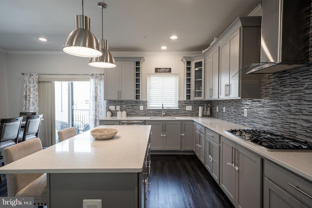 194 Green Poplar Loop, Clarksburg, MD 20871 - kitchen with wall chimney range hood, stainless steel gas stovetop, a sink, ornamental molding, and backsplash