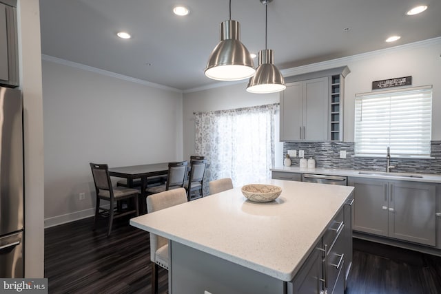 194 Green Poplar Loop, Clarksburg, MD 20871 - kitchen with a sink, gray cabinets, appliances with stainless steel finishes, dark wood-style floors, and ornamental molding
