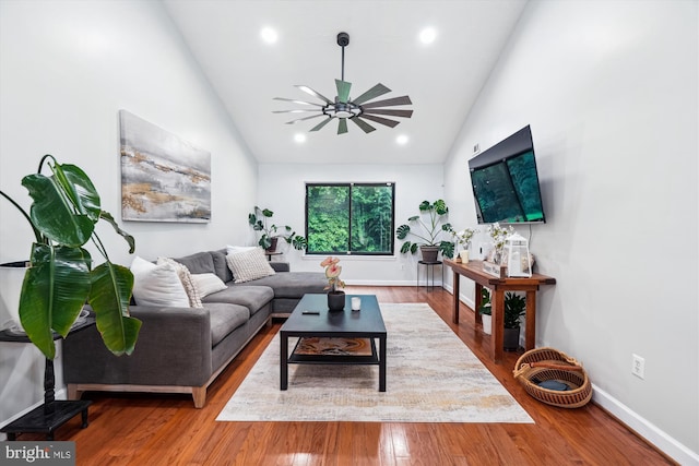 living room featuring a ceiling fan, wood finished floors, baseboards, recessed lighting, and high vaulted ceiling