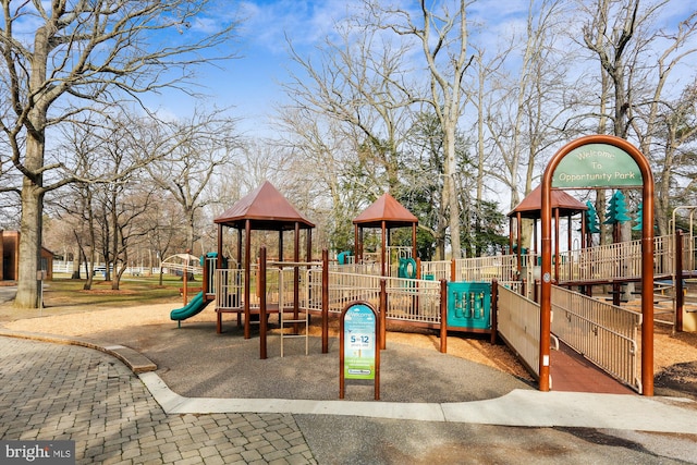 communal playground featuring fence