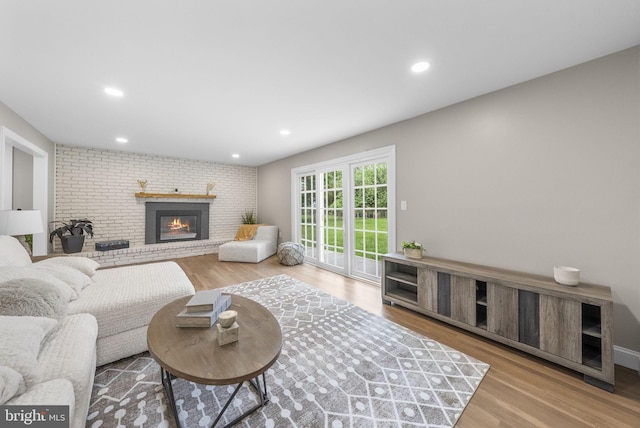 20 Hathaway Dr, Princeton Junction, NJ 08550 - living area with wood finished floors, a fireplace, and recessed lighting