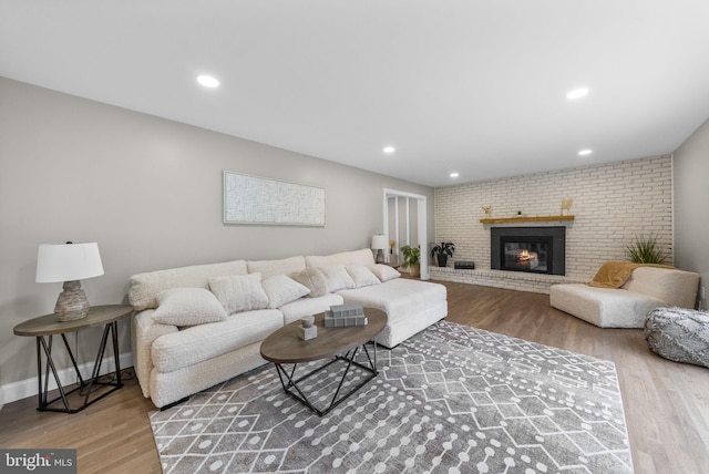 20 Hathaway Dr, Princeton Junction, NJ 08550 - living room featuring wood finished floors, a brick fireplace, recessed lighting, and baseboards