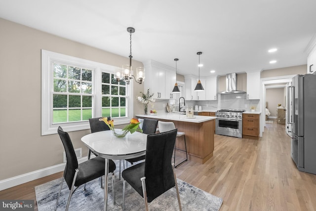 20 Hathaway Dr, Princeton Junction, NJ 08550 - dining area featuring light wood-type flooring, a chandelier, baseboards, and recessed lighting