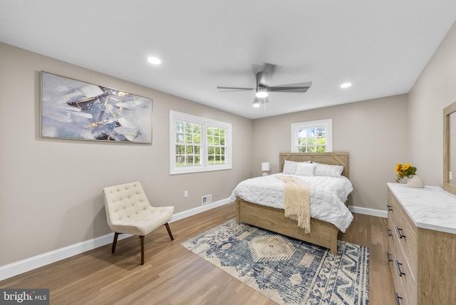 20 Hathaway Dr, Princeton Junction, NJ 08550 - bedroom with baseboards, light wood finished floors, multiple windows, recessed lighting, and a ceiling fan