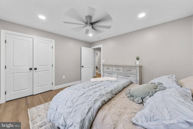 20 Hathaway Dr, Princeton Junction, NJ 08550 - bedroom featuring wood finished floors, baseboards, recessed lighting, a ceiling fan, and a closet