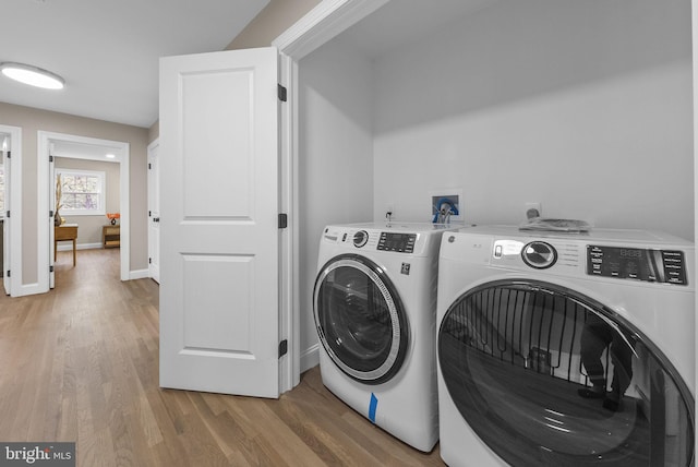20 Hathaway Dr, Princeton Junction, NJ 08550 - laundry room featuring independent washer and dryer, light wood-style floors, and baseboards