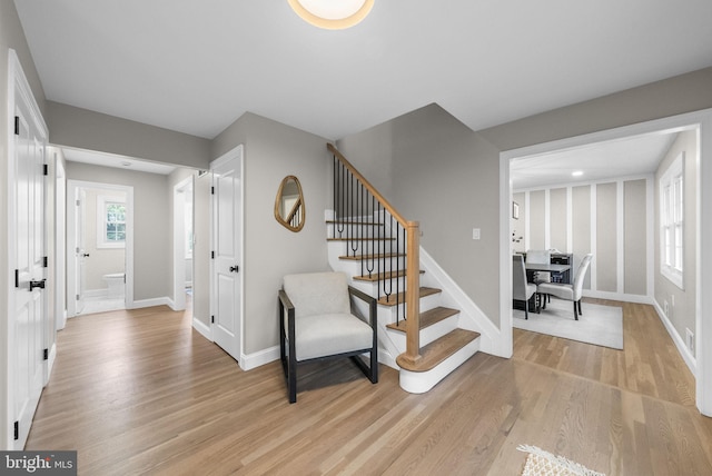 20 Hathaway Dr, Princeton Junction, NJ 08550 - entryway with light wood-type flooring, stairs, and baseboards