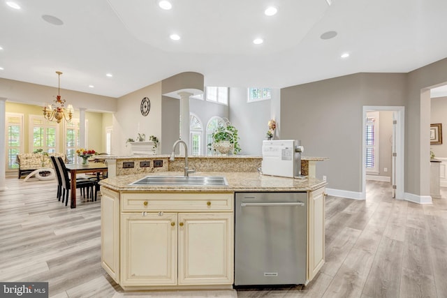 12723 Lady Somerset Ln, Fairfax, VA 22033 - kitchen with cream cabinetry, a sink, stainless steel dishwasher, plenty of natural light, and recessed lighting