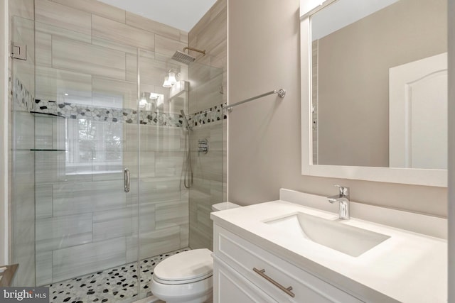 12723 Lady Somerset Ln, Fairfax, VA 22033 - bathroom featuring vanity, a stall shower, and toilet