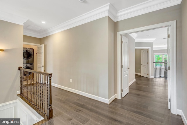 12723 Lady Somerset Ln, Fairfax, VA 22033 - hallway with stacked washer / drying machine, crown molding, dark wood finished floors, an upstairs landing, and baseboards