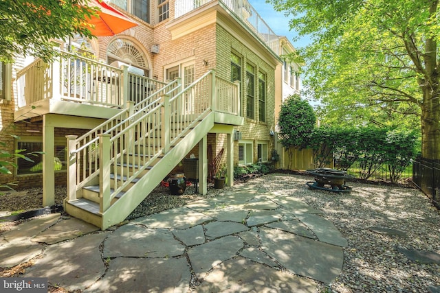 12723 Lady Somerset Ln, Fairfax, VA 22033 - view of patio featuring a fire pit, stairs, and a wooden deck