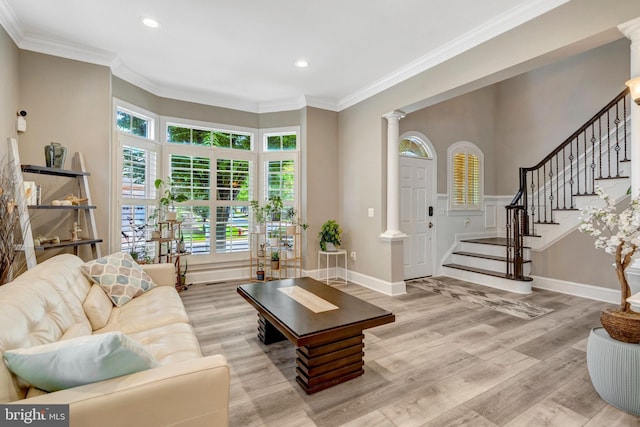 12723 Lady Somerset Ln, Fairfax, VA 22033 - living area with ornate columns, stairs, light wood-style flooring, ornamental molding, and recessed lighting