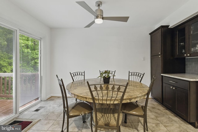 9213 Fairlane Pl, Laurel, MD 20708 - dining space with light tile patterned floors and ceiling fan