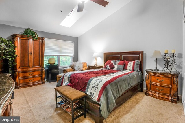 9213 Fairlane Pl, Laurel, MD 20708 - bedroom with light colored carpet, a skylight, ceiling fan, and high vaulted ceiling