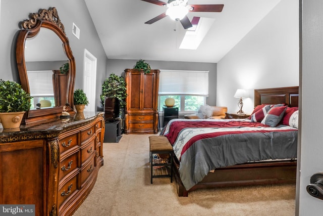 9213 Fairlane Pl, Laurel, MD 20708 - bedroom with lofted ceiling, light colored carpet, a skylight, and a ceiling fan