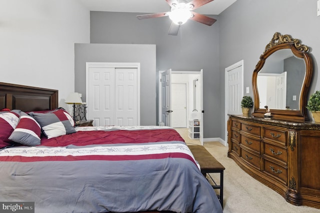 9213 Fairlane Pl, Laurel, MD 20708 - bedroom featuring high vaulted ceiling, light carpet, two closets, ceiling fan, and baseboards