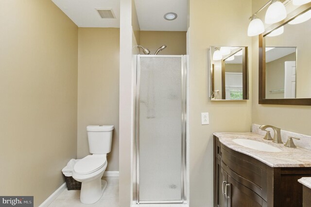 9213 Fairlane Pl, Laurel, MD 20708 - full bathroom featuring a shower stall, vanity, toilet, tile patterned flooring, and baseboards