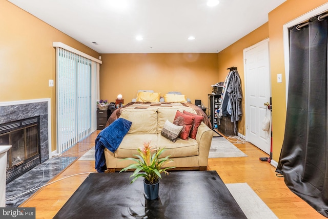 9213 Fairlane Pl, Laurel, MD 20708 - living area featuring wood finished floors, recessed lighting, and a high end fireplace