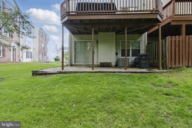 9213 Fairlane Pl, Laurel, MD 20708 - rear view of house with a yard and a wooden deck