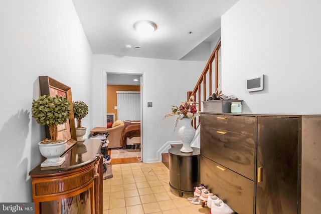 9213 Fairlane Pl, Laurel, MD 20708 - foyer with light tile patterned floors and stairway