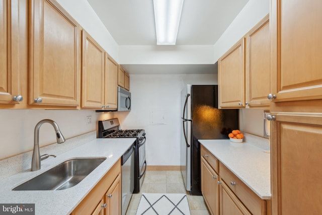 2510 Virginia Ave NW Unit 2Bn, Washington, DC 20037 - kitchen featuring appliances with stainless steel finishes, a sink, light brown cabinets, baseboards, and light tile patterned flooring