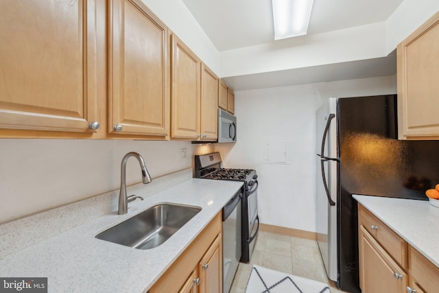 2510 Virginia Ave NW Unit 2Bn, Washington, DC 20037 - kitchen featuring stainless steel appliances, a sink, light brown cabinets, and light stone counters