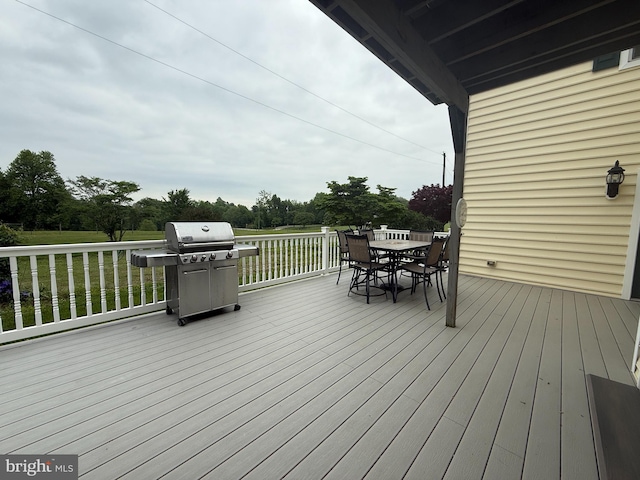 663 Tomlin Station Rd, Mullica Hill, NJ 08062 - deck featuring grilling area, outdoor dining area, and a yard