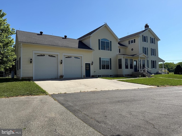 663 Tomlin Station Rd, Mullica Hill, NJ 08062 - view of front of home with driveway, a garage, and a front yard