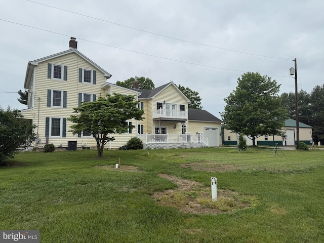 663 Tomlin Station Rd, Mullica Hill, NJ 08062 - traditional-style home featuring a chimney and a front lawn