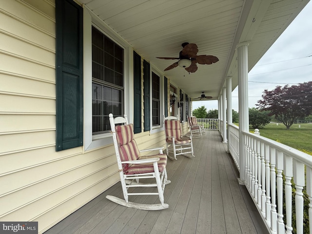 663 Tomlin Station Rd, Mullica Hill, NJ 08062 - wooden porch featuring a ceiling fan