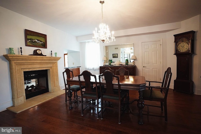 663 Tomlin Station Rd, Mullica Hill, NJ 08062 - dining room with a chandelier, wood finished floors, a premium fireplace, and baseboards