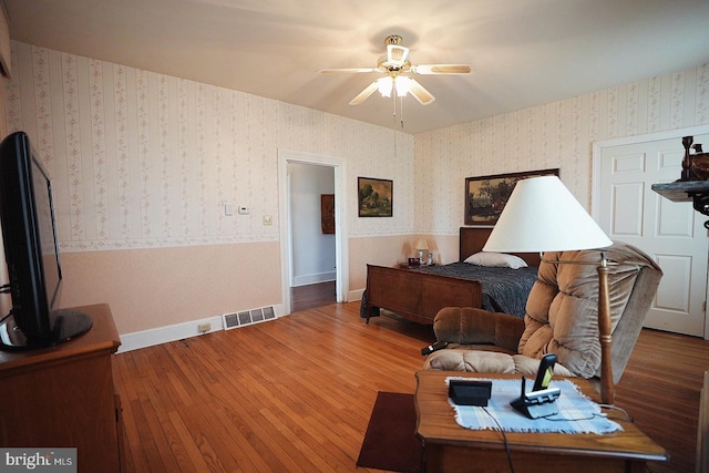 663 Tomlin Station Rd, Mullica Hill, NJ 08062 - living room with ceiling fan, wood-type flooring, wallpapered walls, and baseboards