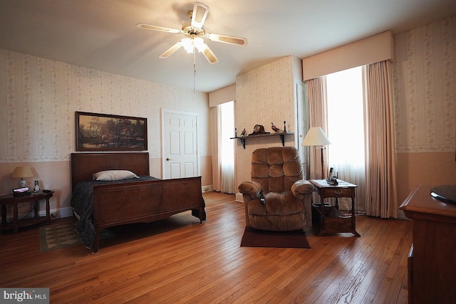 663 Tomlin Station Rd, Mullica Hill, NJ 08062 - bedroom featuring wallpapered walls, hardwood / wood-style flooring, and a ceiling fan