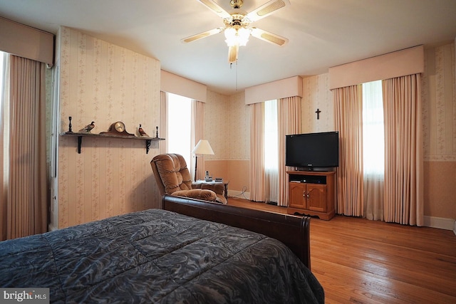 663 Tomlin Station Rd, Mullica Hill, NJ 08062 - bedroom featuring wallpapered walls, light wood-style flooring, baseboards, and ceiling fan