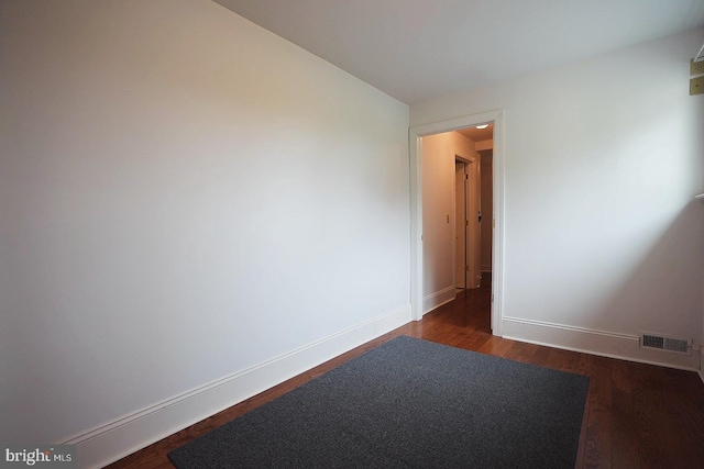 663 Tomlin Station Rd, Mullica Hill, NJ 08062 - empty room with baseboards and dark wood finished floors