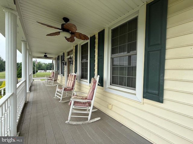 663 Tomlin Station Rd, Mullica Hill, NJ 08062 - porch with a ceiling fan