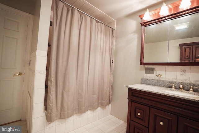 663 Tomlin Station Rd, Mullica Hill, NJ 08062 - full bathroom with vanity, shower / tub combo with curtain, tasteful backsplash, and tile patterned floors