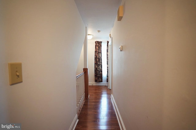 663 Tomlin Station Rd, Mullica Hill, NJ 08062 - hallway with dark wood-style flooring, an upstairs landing, and baseboards
