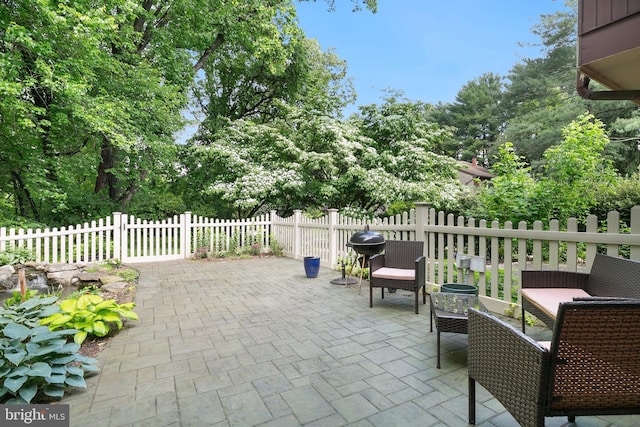 view of patio with fence