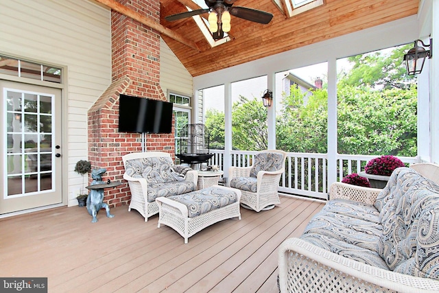 15420 Cedarhurst Ct, Centreville, VA 20120 - sunroom / solarium featuring a ceiling fan, lofted ceiling, a skylight, and outdoor lounge area
