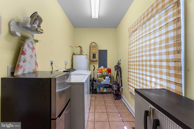 1417 Royal Way, Montross, VA 22520 - washroom with washing machine and dryer, water heater, light tile patterned floors, electric panel, and baseboards